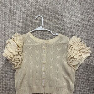 Chic Cream Knit Cardigan with Ruffled Sleeves